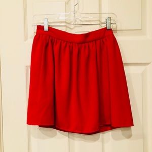Bright red skirt